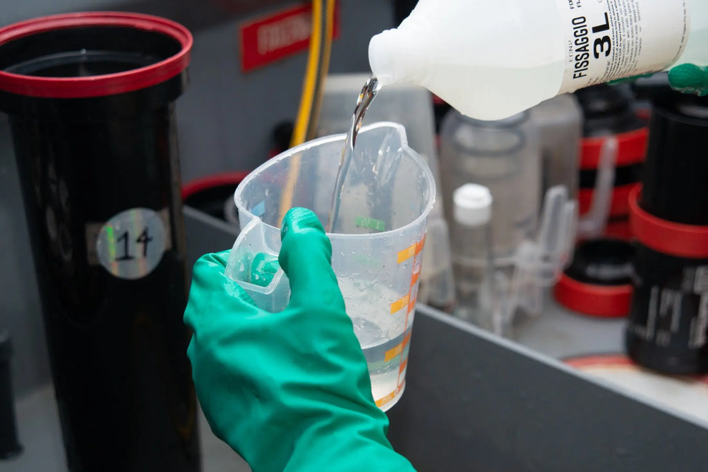 Close-up of liquid being poured into a graduated jug at Berlin Photo Studio